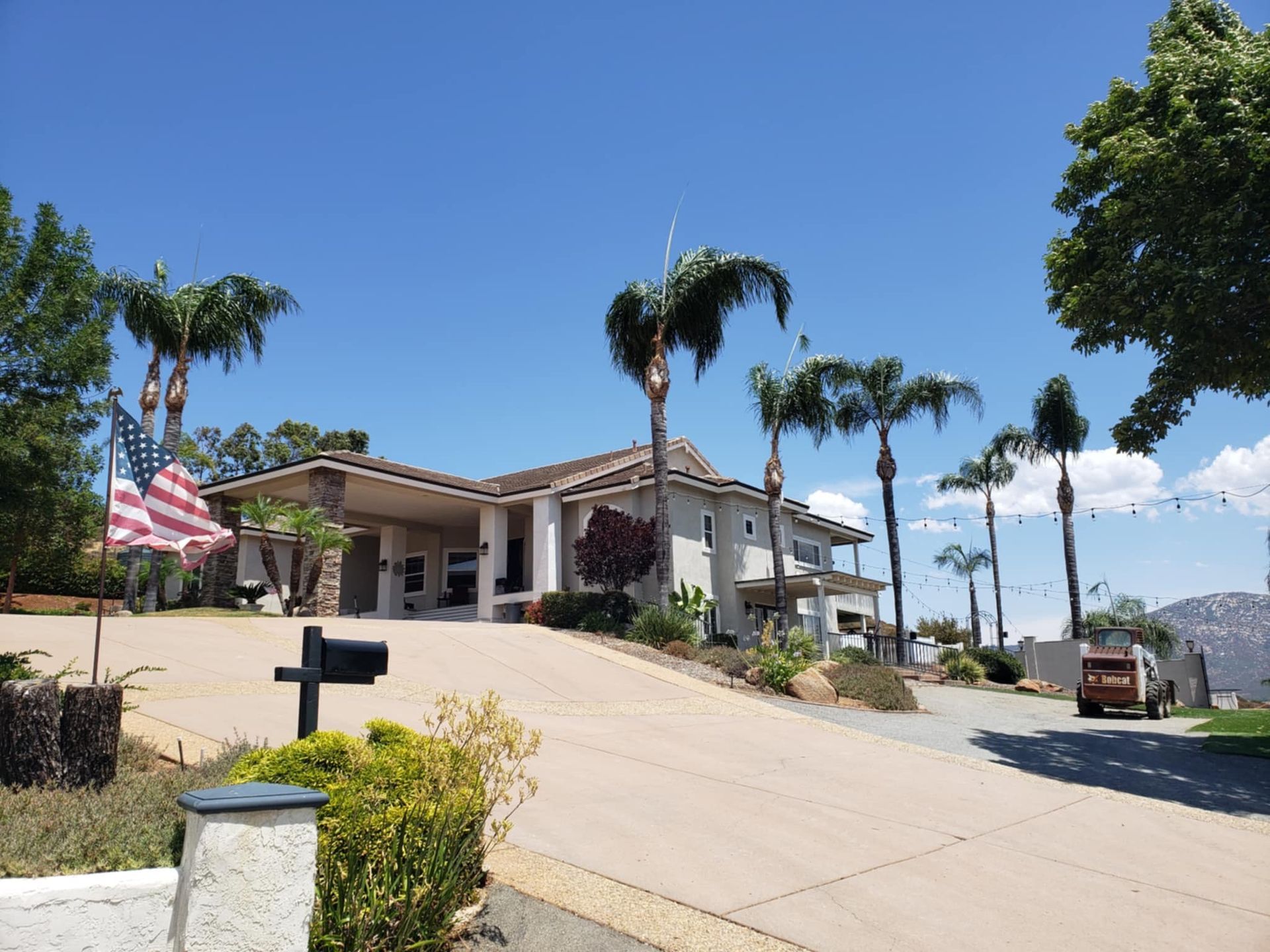 A person is using a chainsaw to cut a piece of wood.