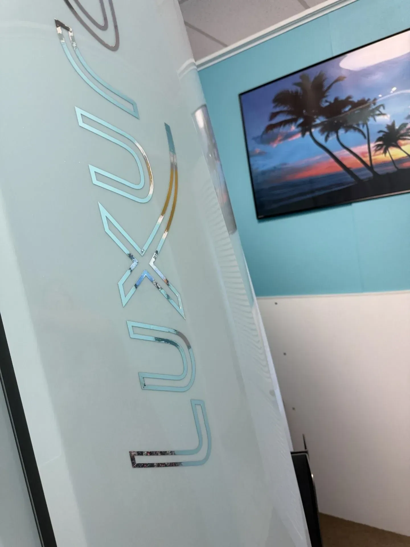 White tanning bed with silver 