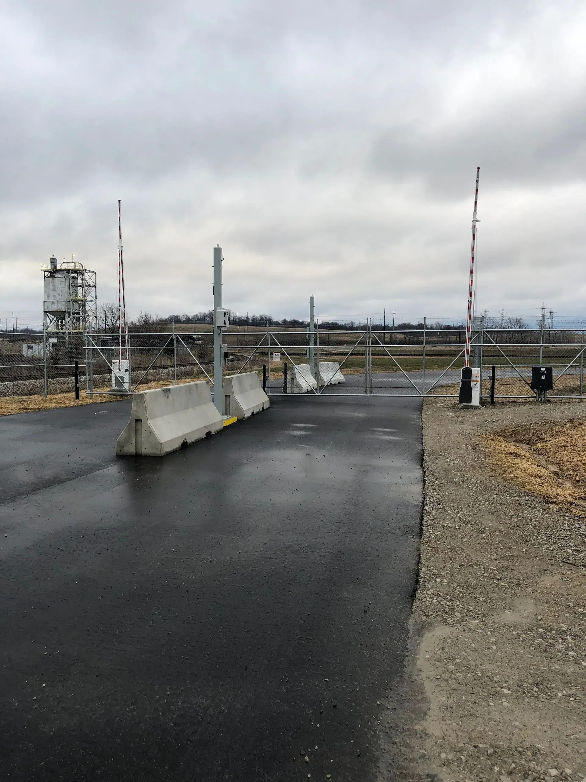 A road with concrete barriers on the side of it