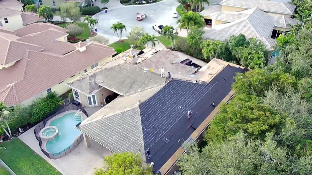 crew on top of the roof