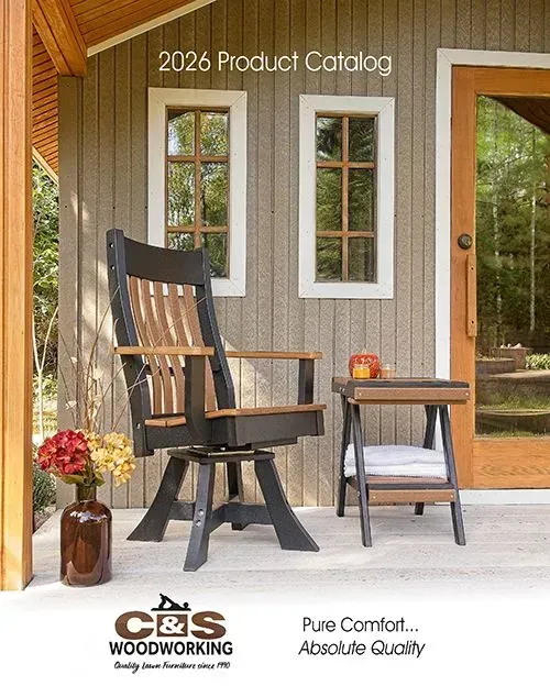 Woodworking product catalog cover showing a black rocking chair and side table on a porch