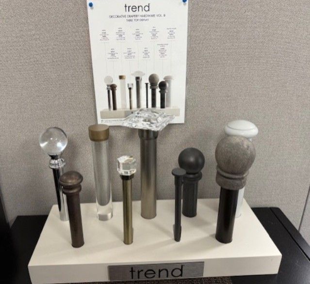 display of various curtain rod finials in different styles