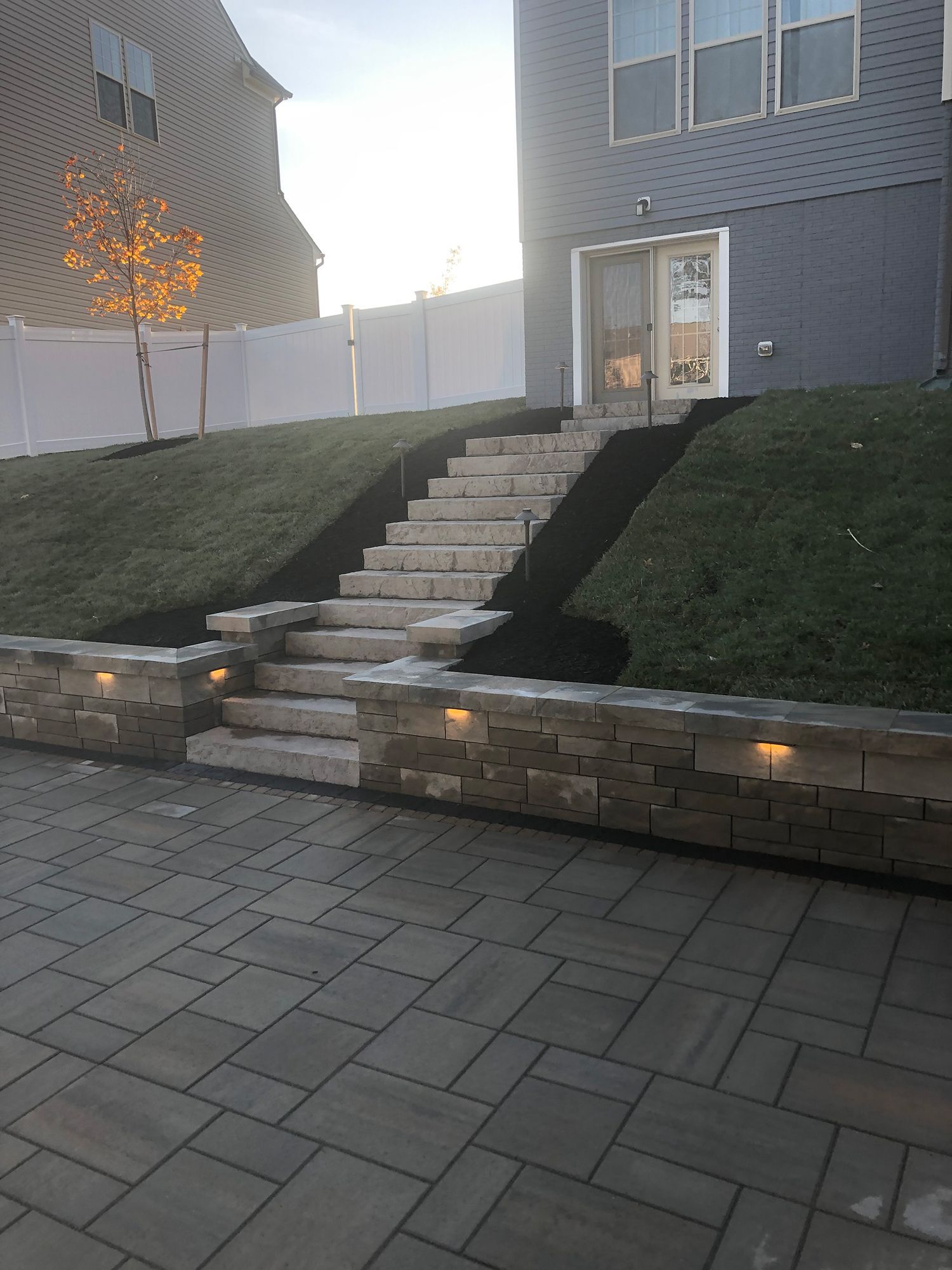 A set of stairs leading up to a house.