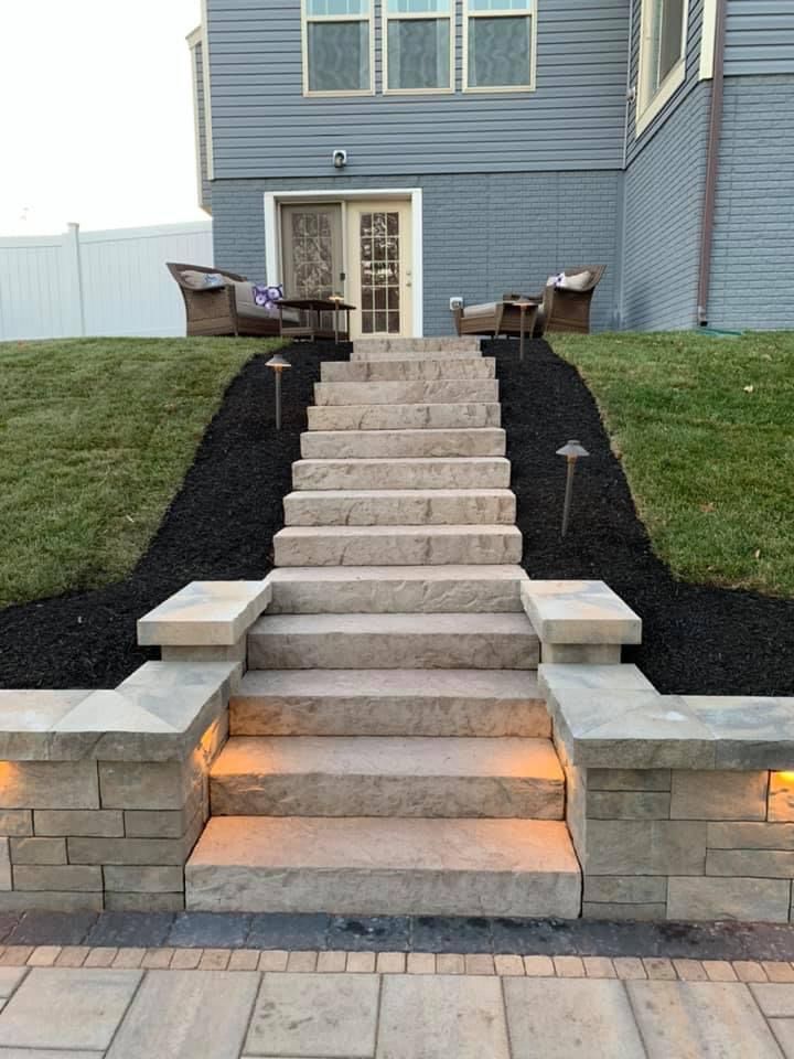A set of stairs leading up to a house.