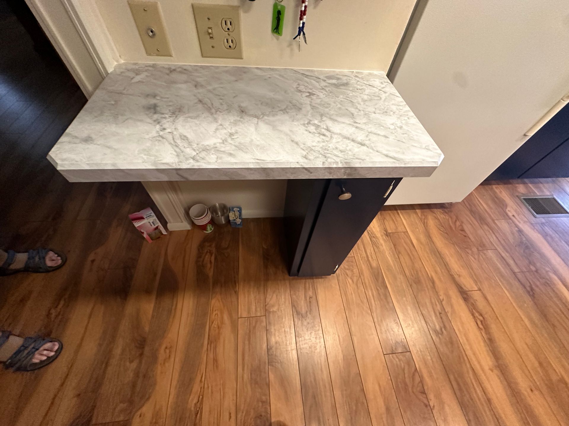 A wooden floor with a countertop