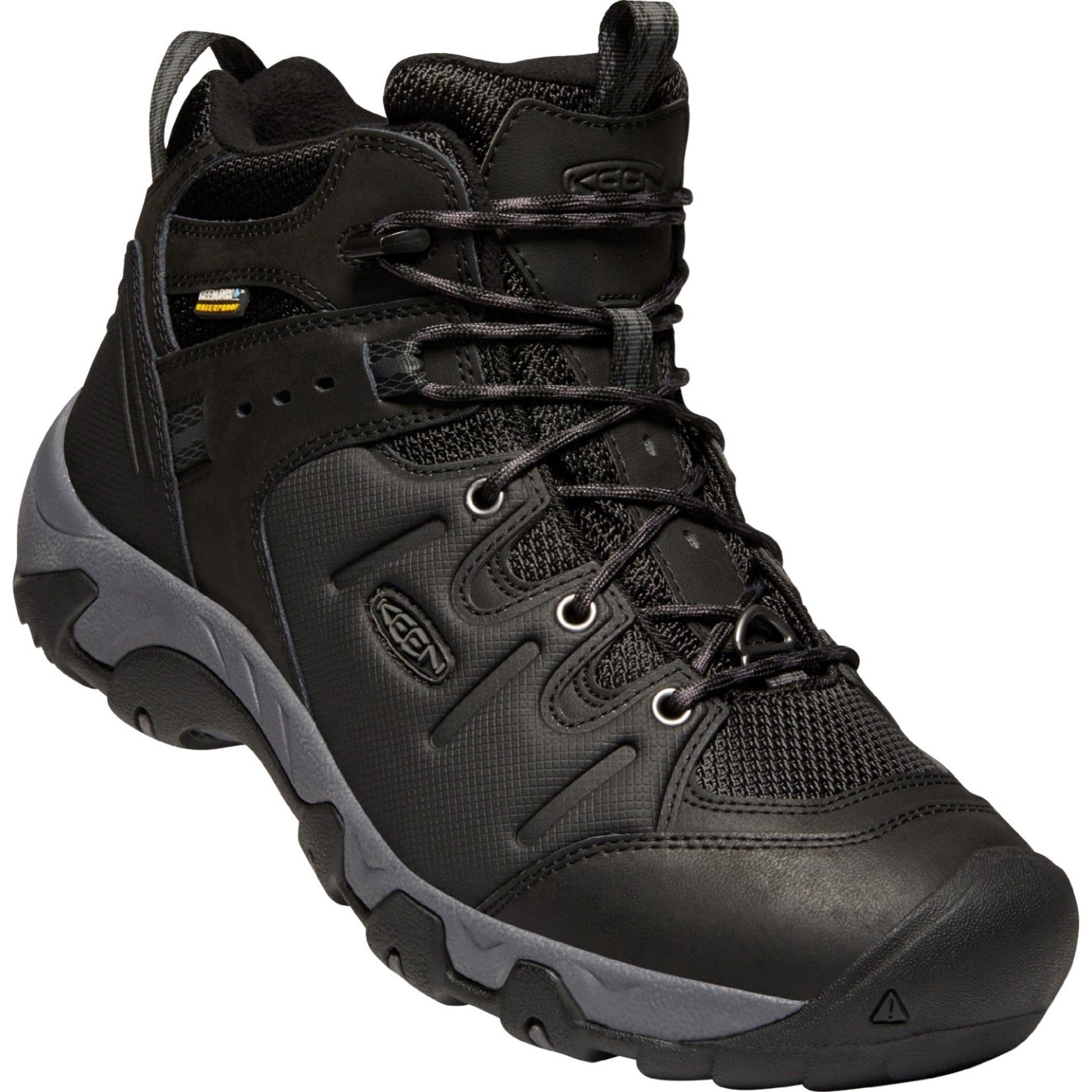 A pair of black keen hiking boots on a white background.