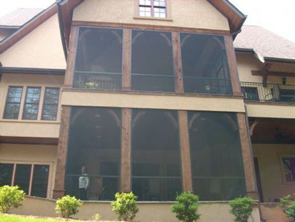 Upper and lower screened areas showing decorative brackets on the inside to avoid nesting areas for birds