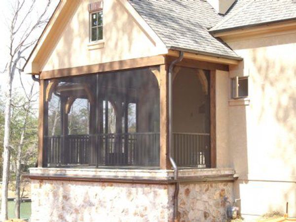 Side view of screen enclosure with brackets and our rail and picket system