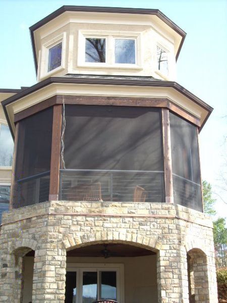 Enclosure with cable rail behind bronze chair rail