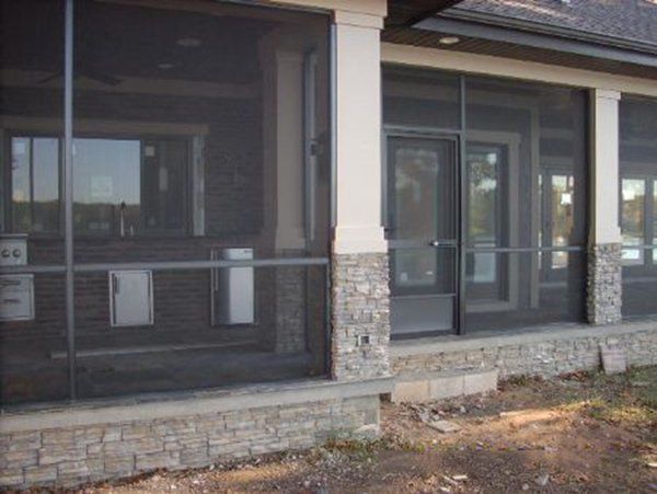 Standard aluminum screen door on screen enclosure