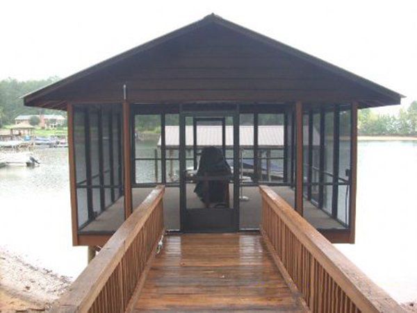 Screened dock on Lake Norman with bronze aluminum framing and two doors