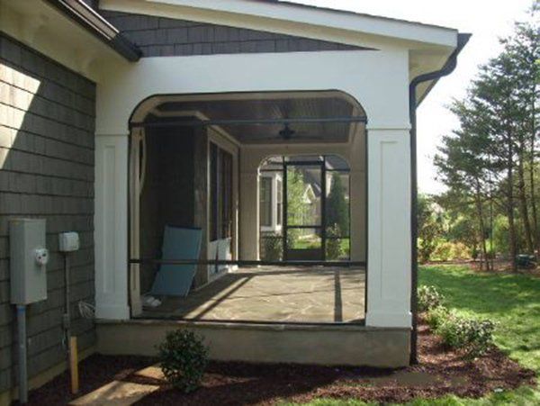 Radius corners with bronze aluminum arch framing in Davidson NC