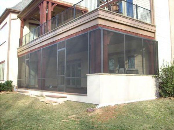 Lake level screen enclosure with bump out for grill area\