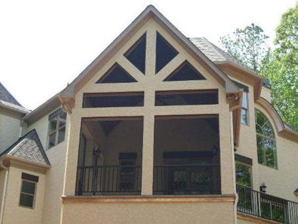 New Construction with fiberglass insect screen, rail and pickets, and open screened gable
