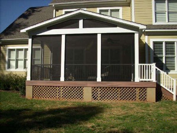 Bronze aluminum framing on white porch with rail and pickets
