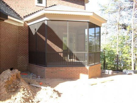 Three structural posts with rail and pickets