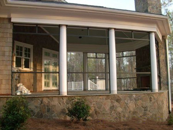 Finished screen porch with white columns