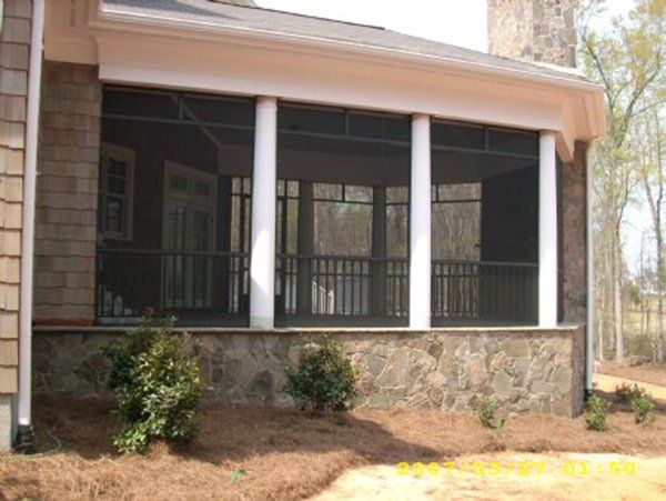 Side view of bronze frame with transoms before screening and pickets