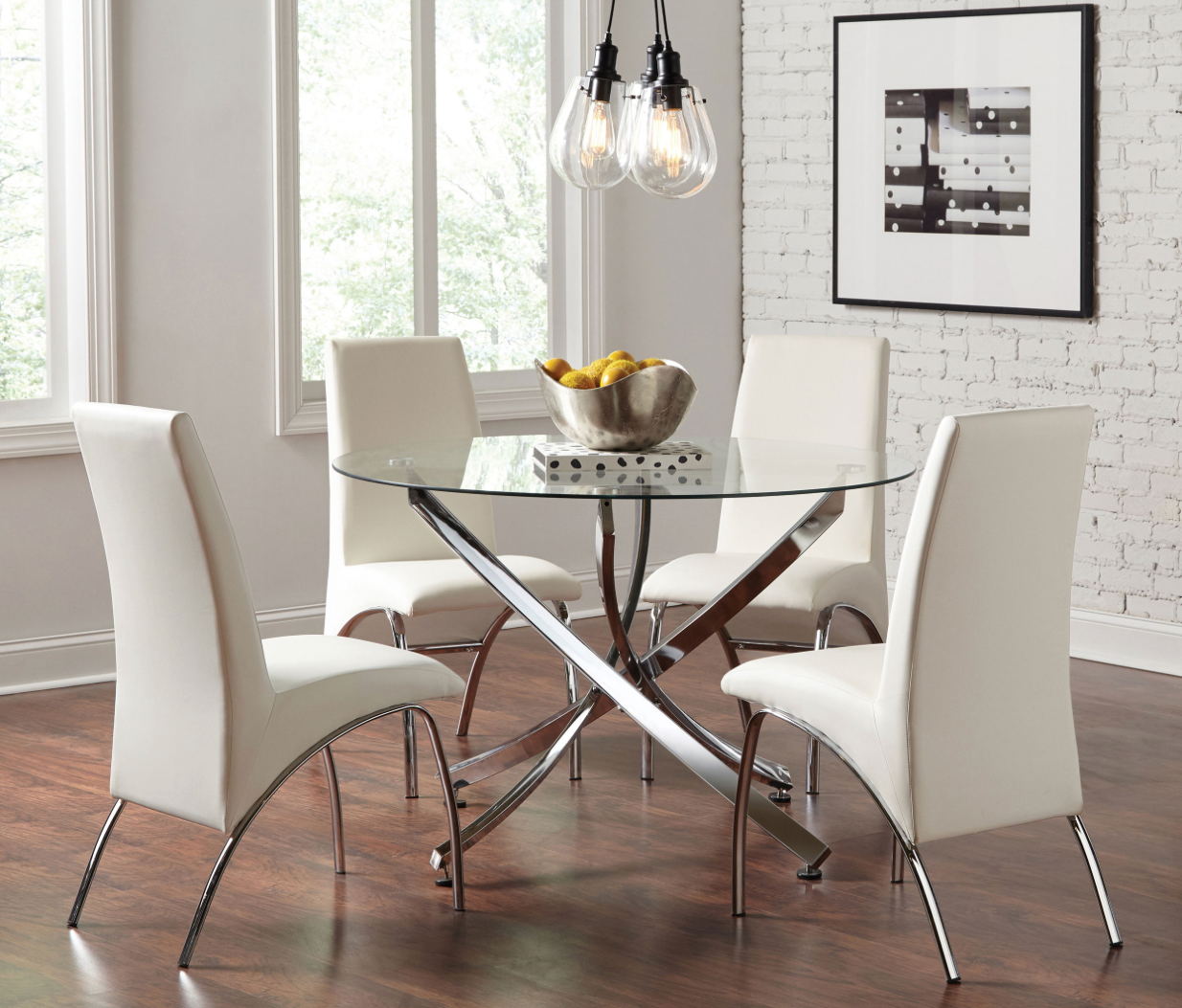 A dining room with a glass table and white chairs