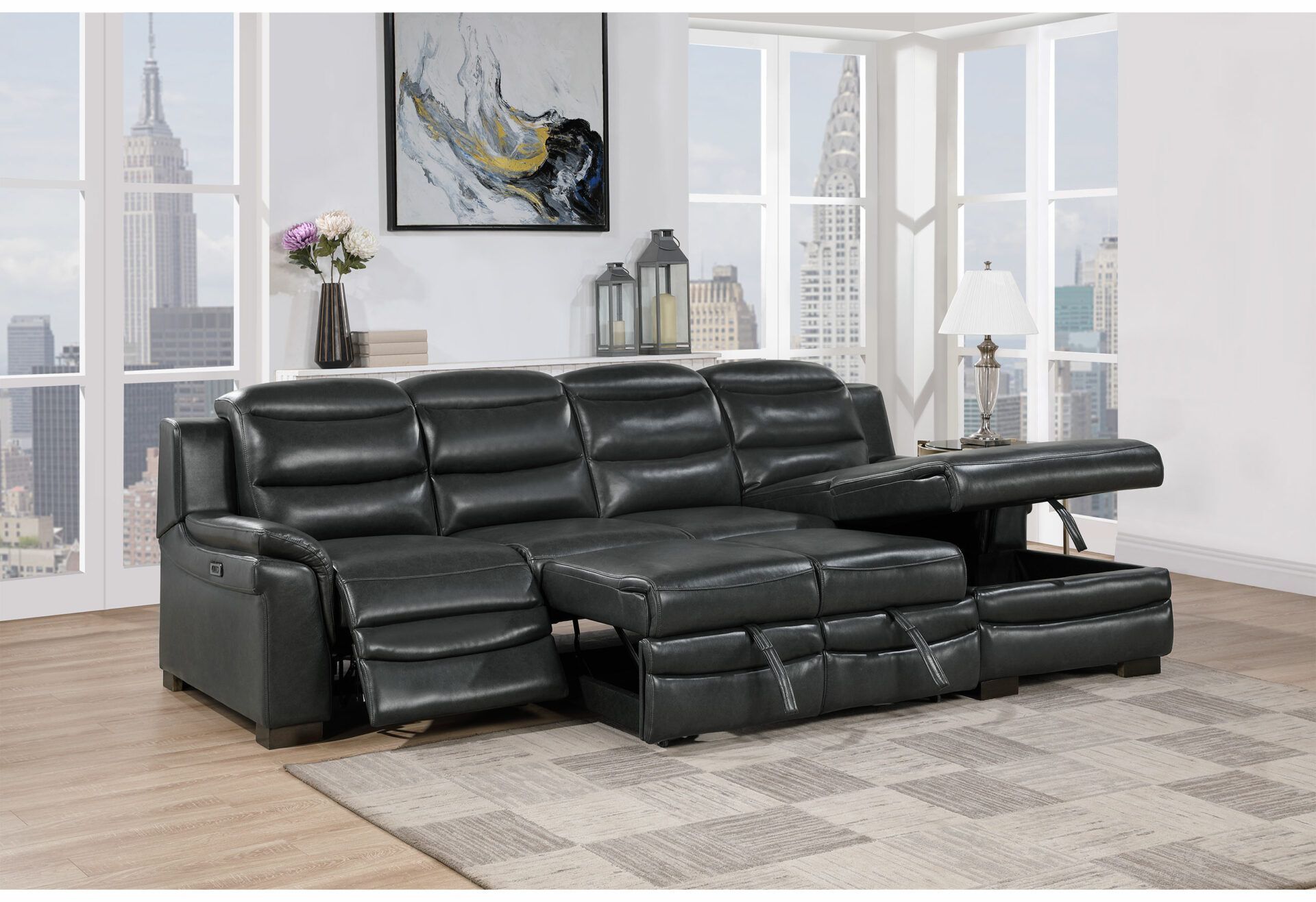 A black leather sectional couch is sitting in a living room next to a window.