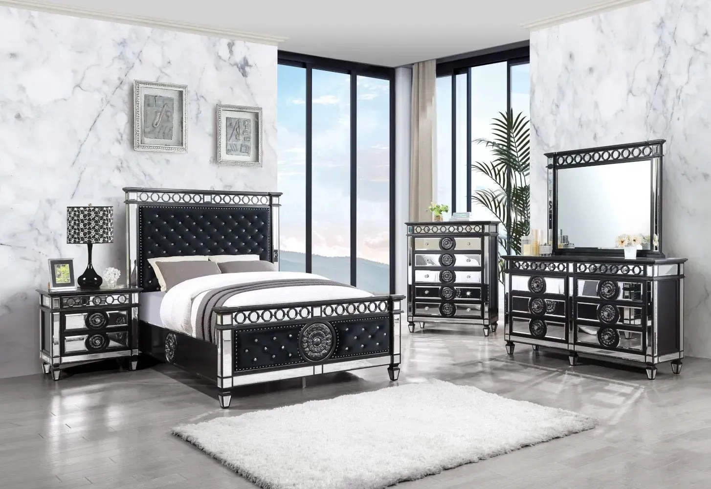 Bedroom set with black, mirrored, and crystal-accented furniture; a large window, and white marble walls.