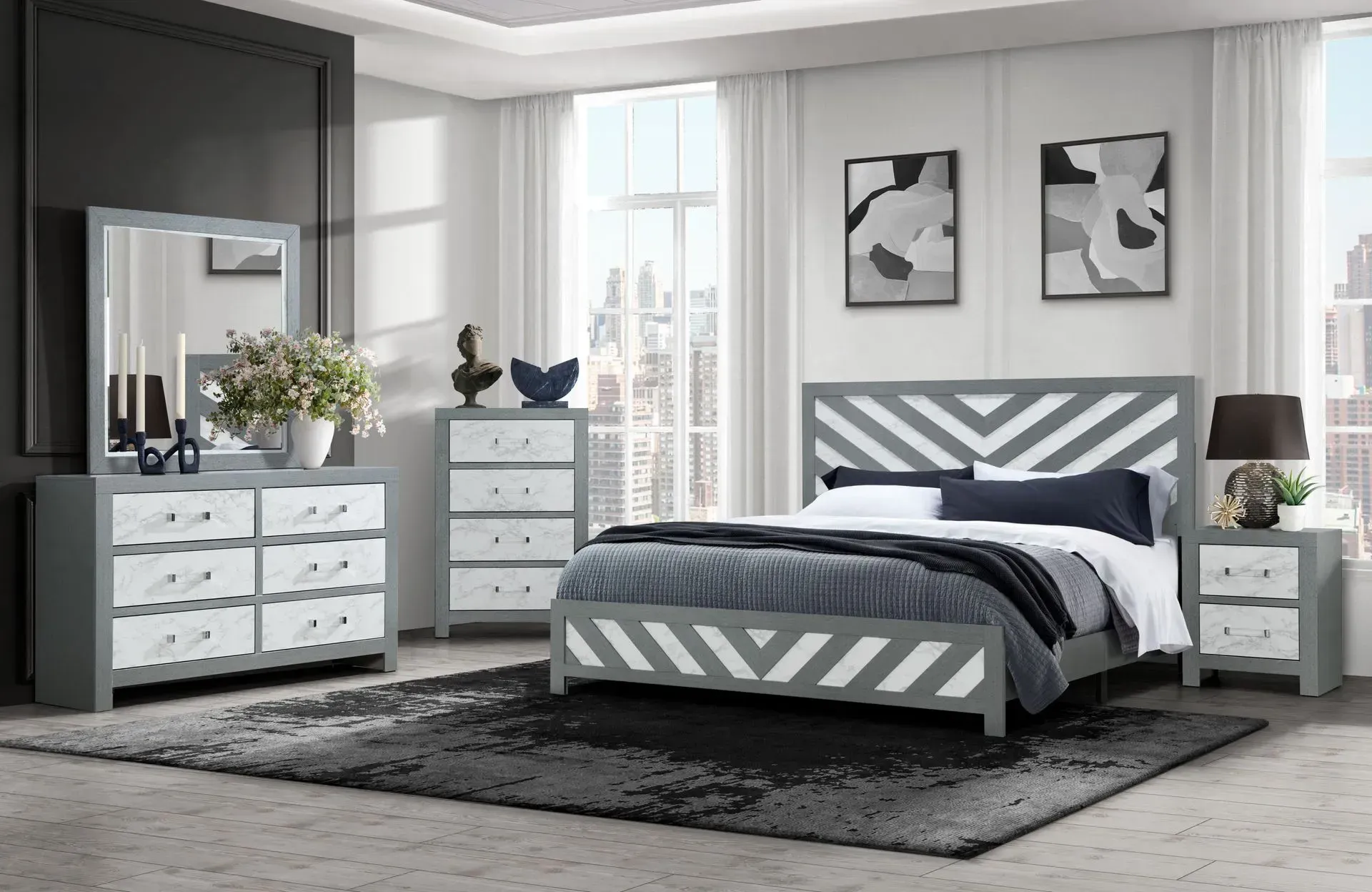 Bedroom furniture set in gray and white with a bed, dresser, chest, and nightstand.