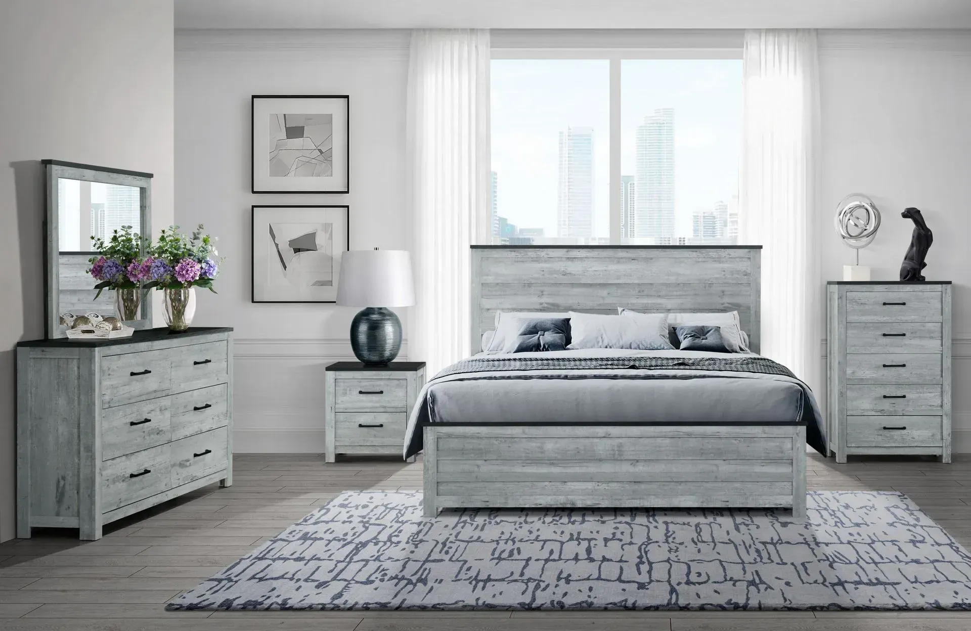 Bedroom furniture set, light gray wood finish, includes a bed, dresser, nightstand, and chest of drawers.