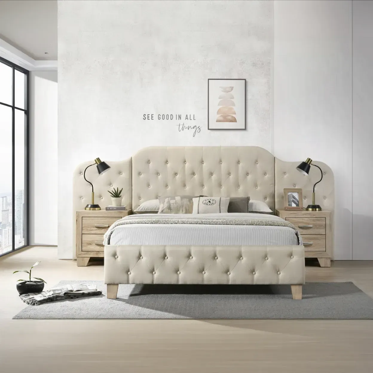 Beige upholstered bed with button-tufted headboard, nightstands, lamps, and art in a modern bedroom.