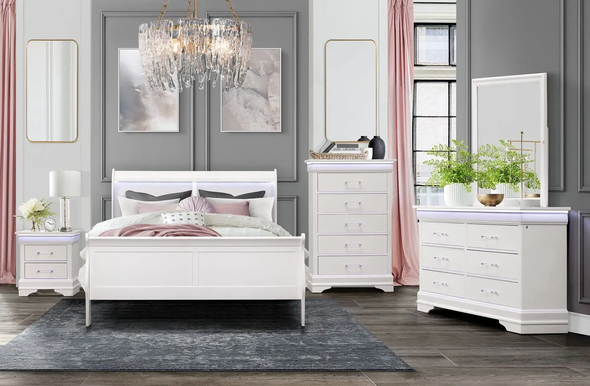 Bedroom set with white furniture, gray walls, pink curtains, and a chandelier.