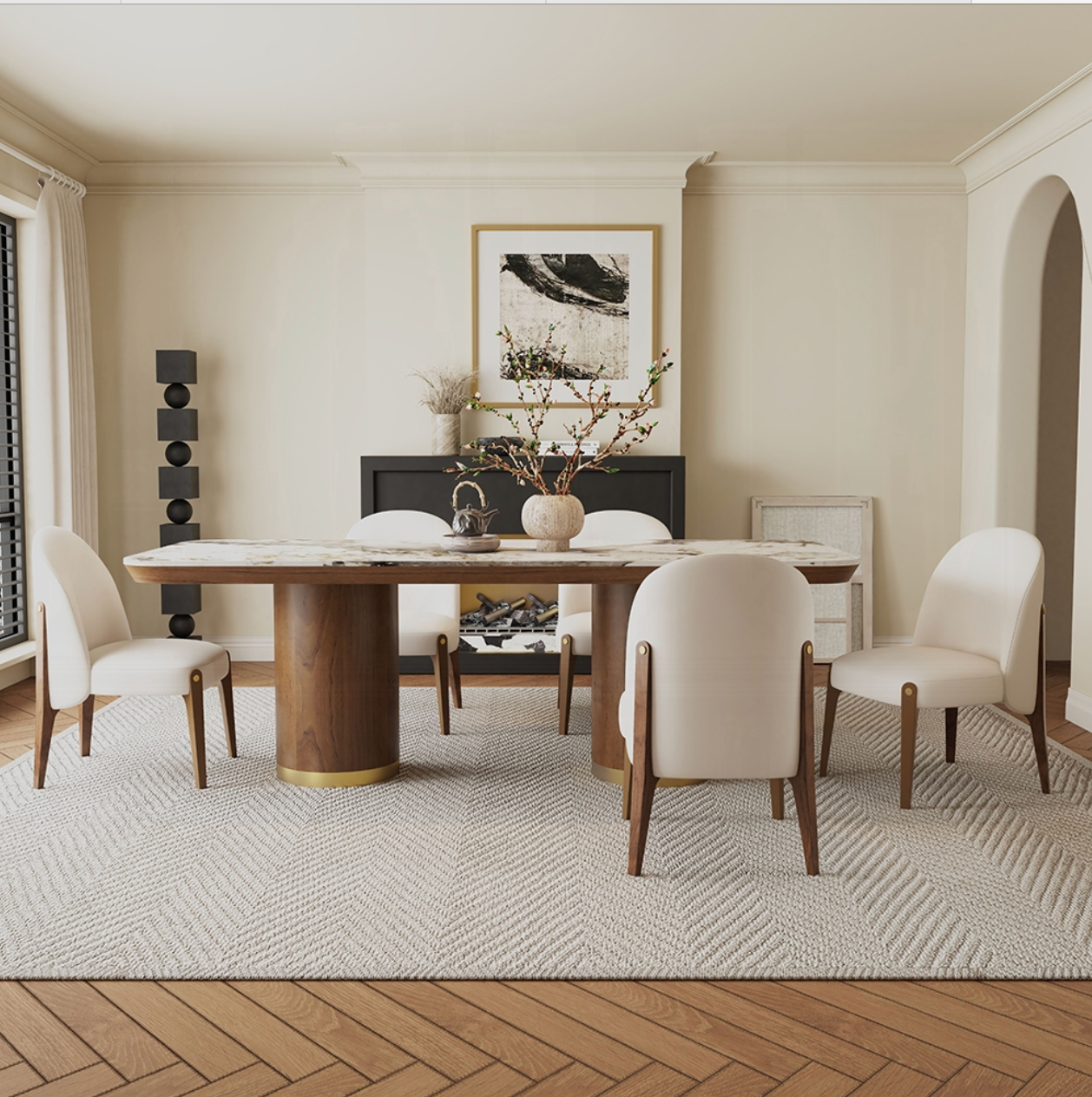 A dining room with a table and chairs and a rug.