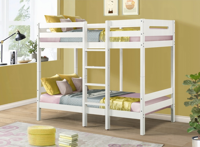 A white bunk bed is in a room with yellow walls.