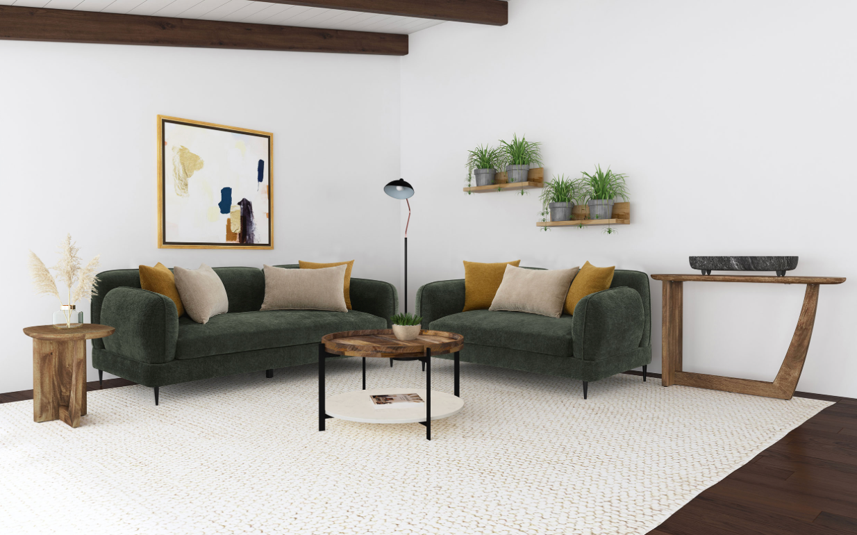 A living room with two green couches and a coffee table.