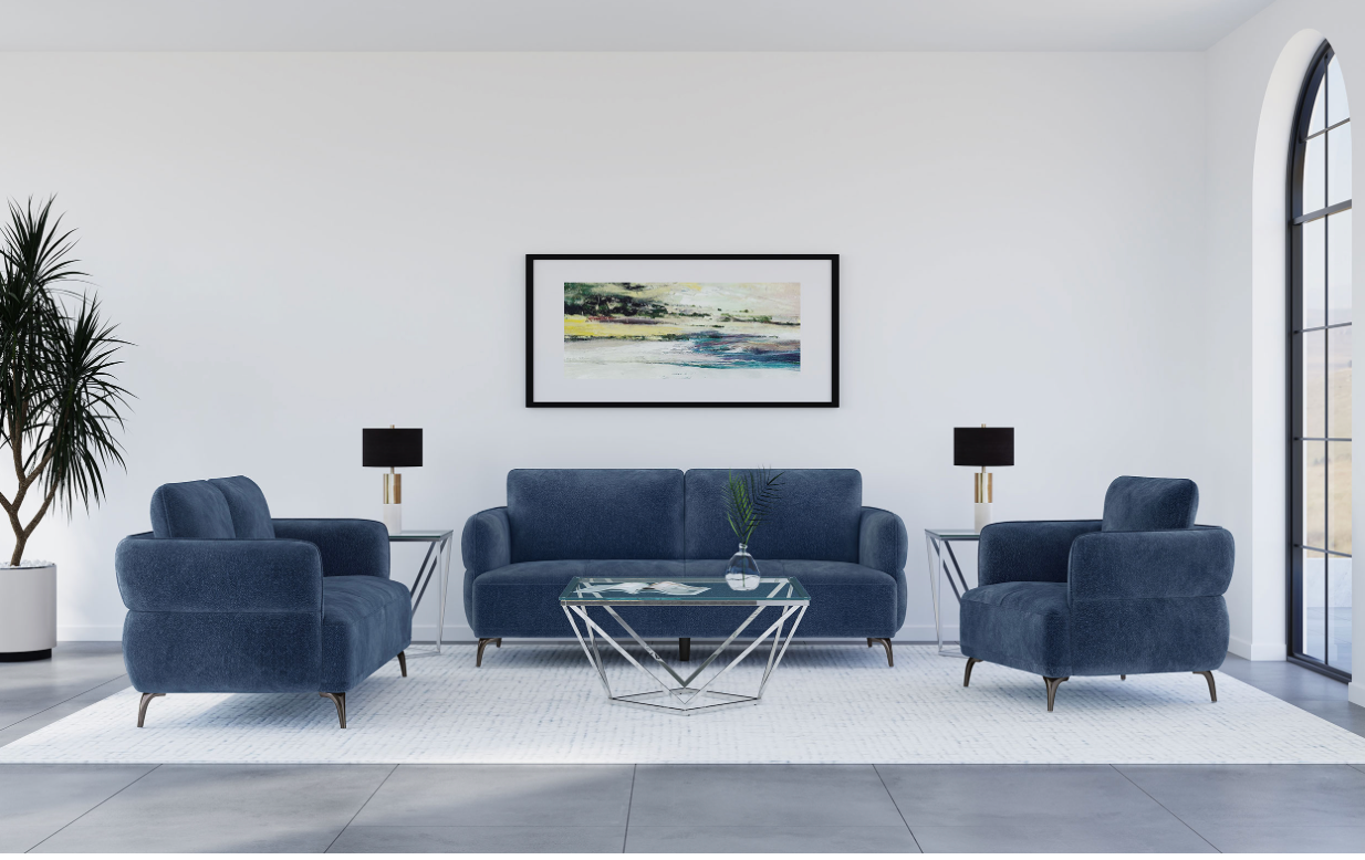 A living room with a blue couch , two chairs , a coffee table and a picture on the wall.