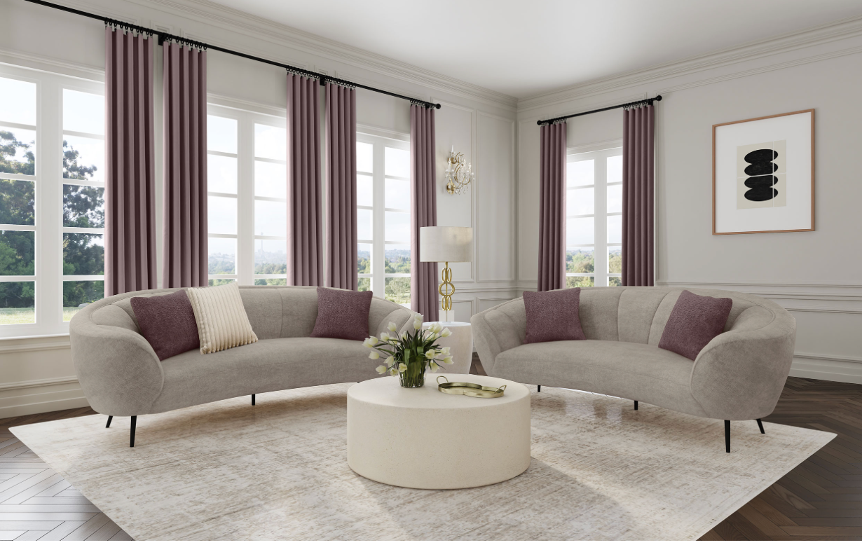 A living room with two couches and a round coffee table.