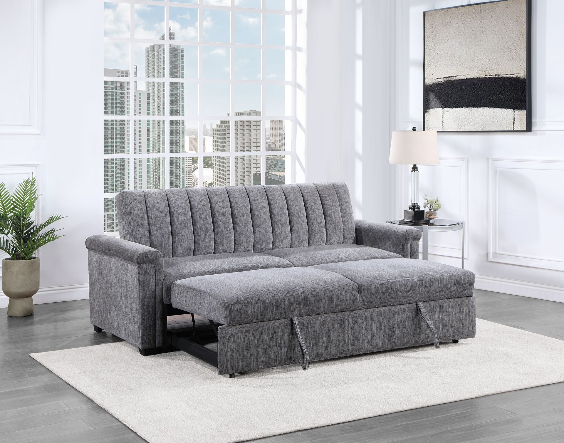 A living room with two gray couches and a coffee table.