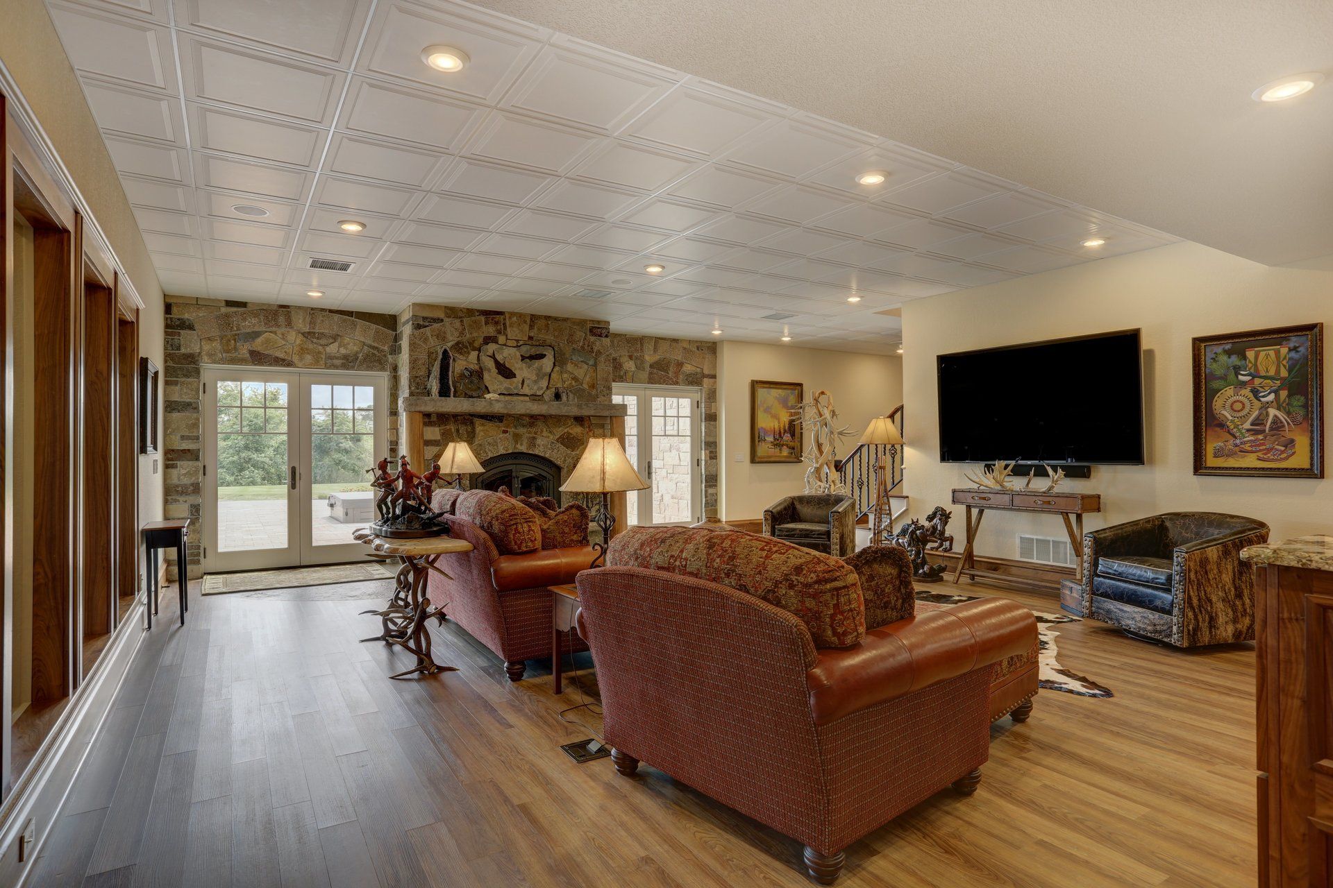 A living room filled with furniture and a flat screen tv.
