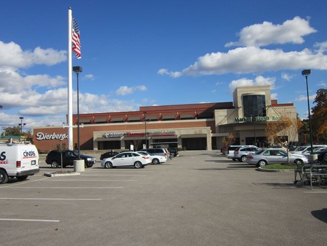 A parking lot in front of a store called derberg