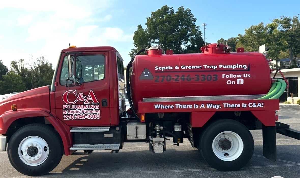 Red CSA tanker truck parked outdoors with white lettering on a red tank and cab