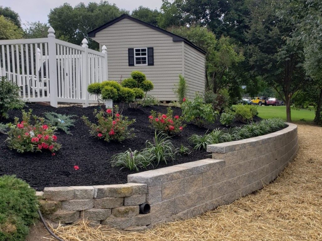 Retaining wall and flower bed
