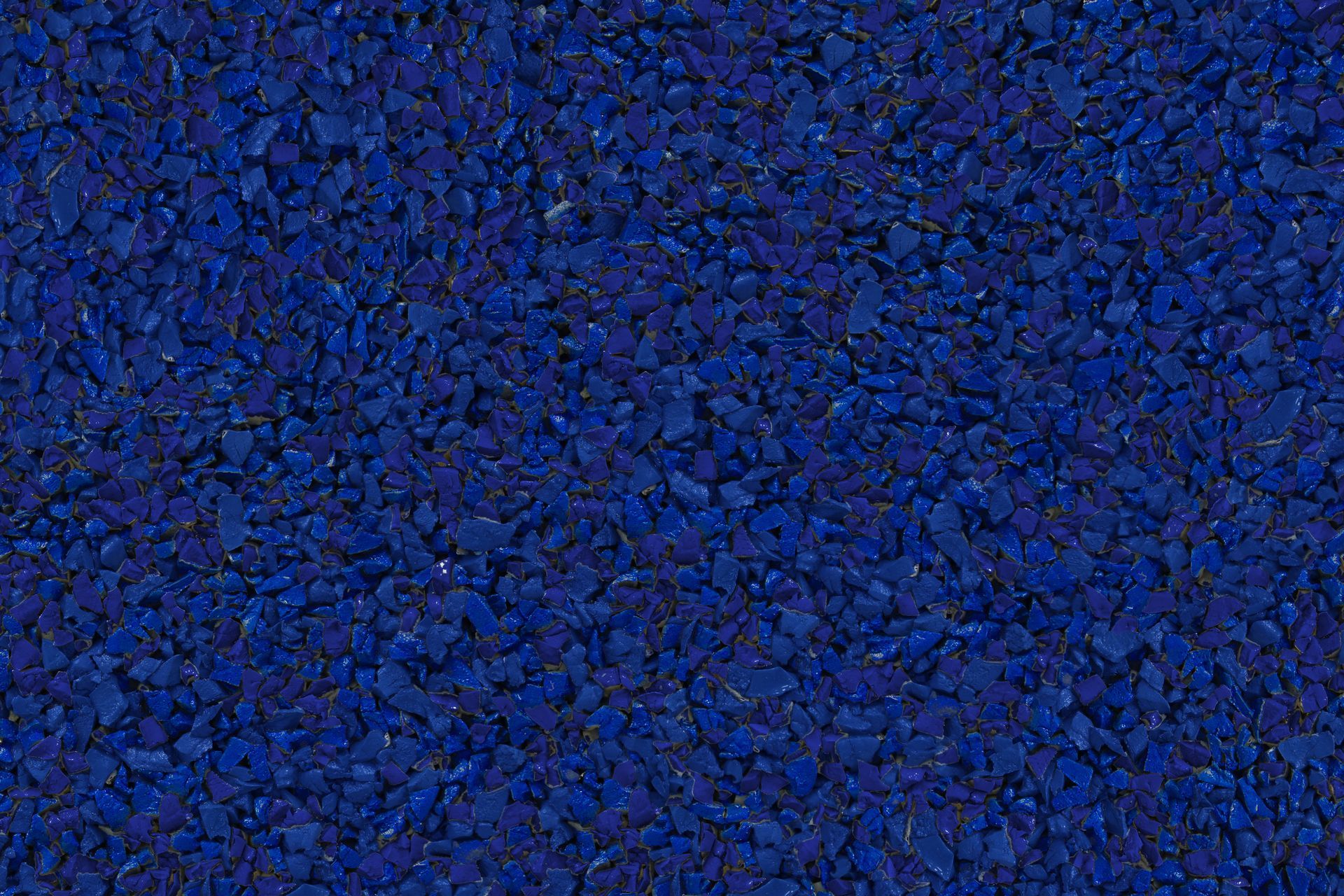A close up of a pile of blue gravel.