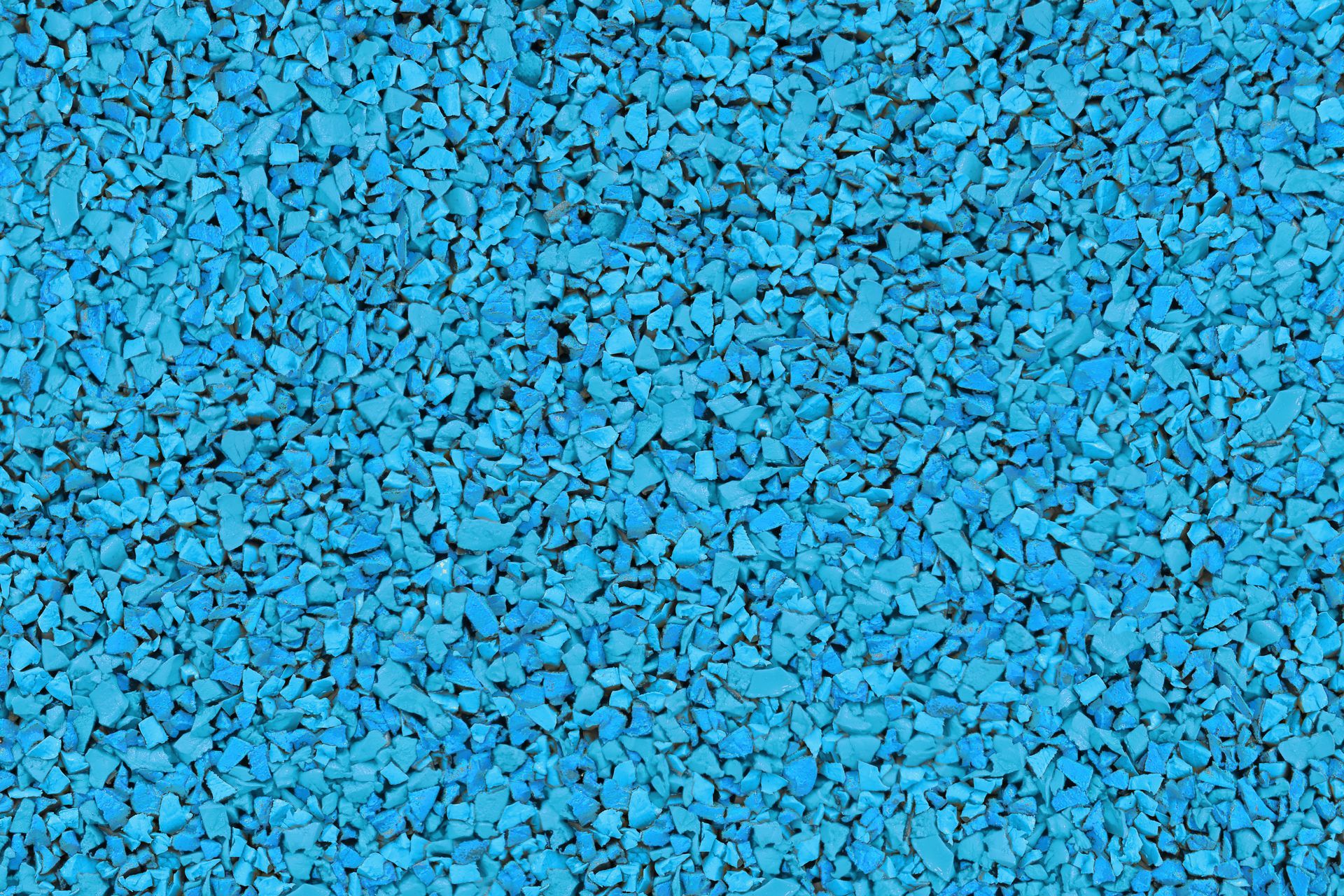 A close up of a pile of blue gravel.