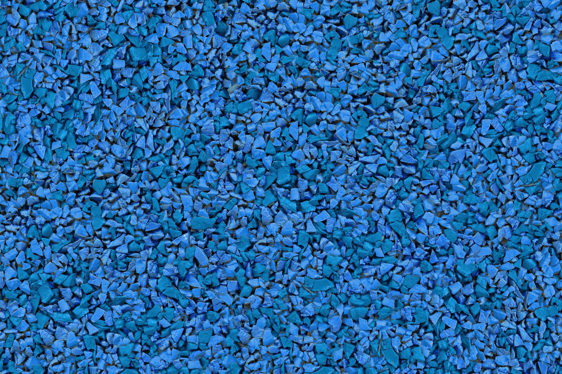 A close up of a pile of blue gravel.