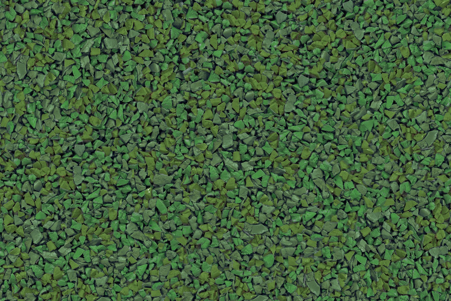 A close up of a pile of green gravel.