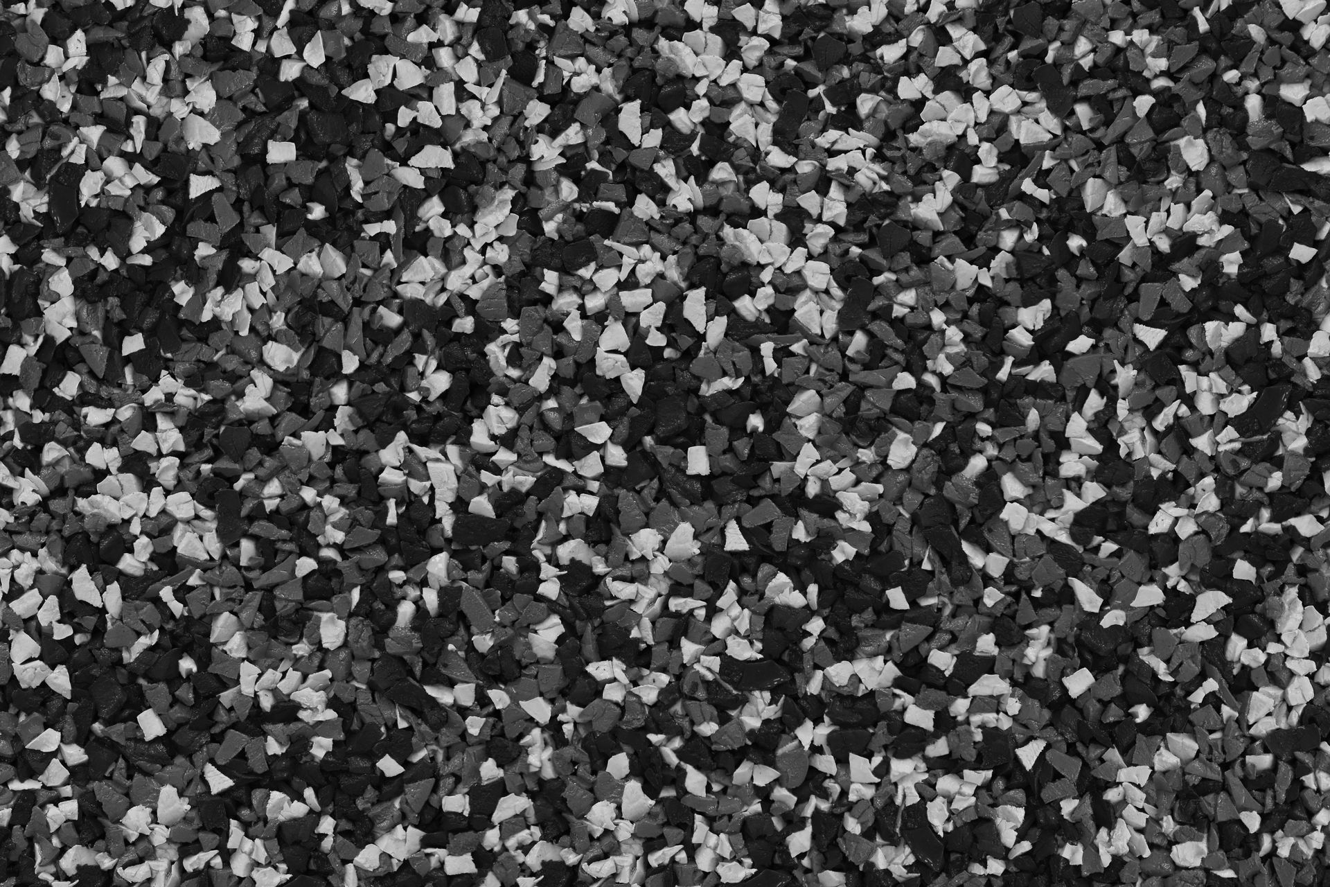A close up of a black and white carpet texture.