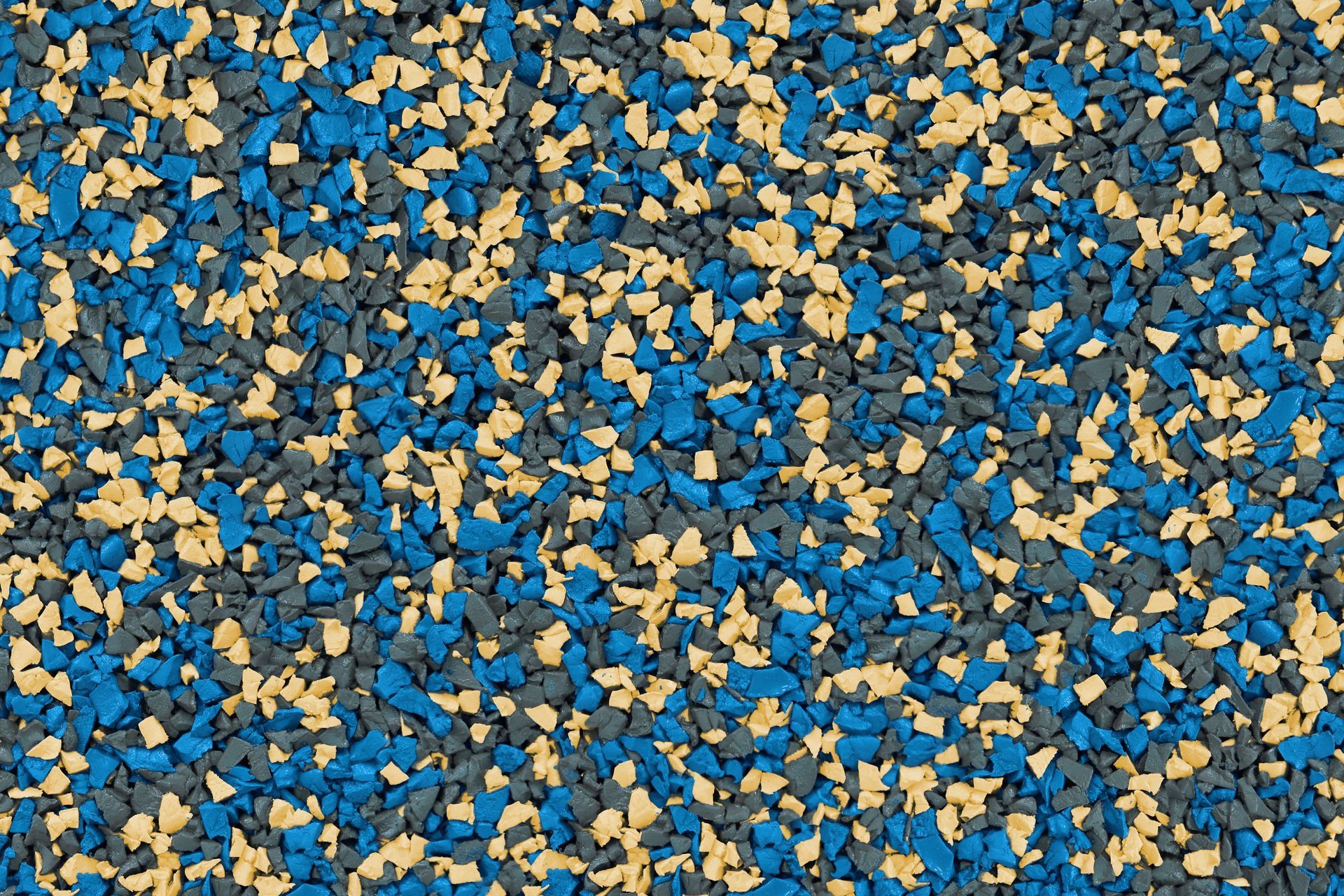 A close up of a blue and yellow rubber surface.