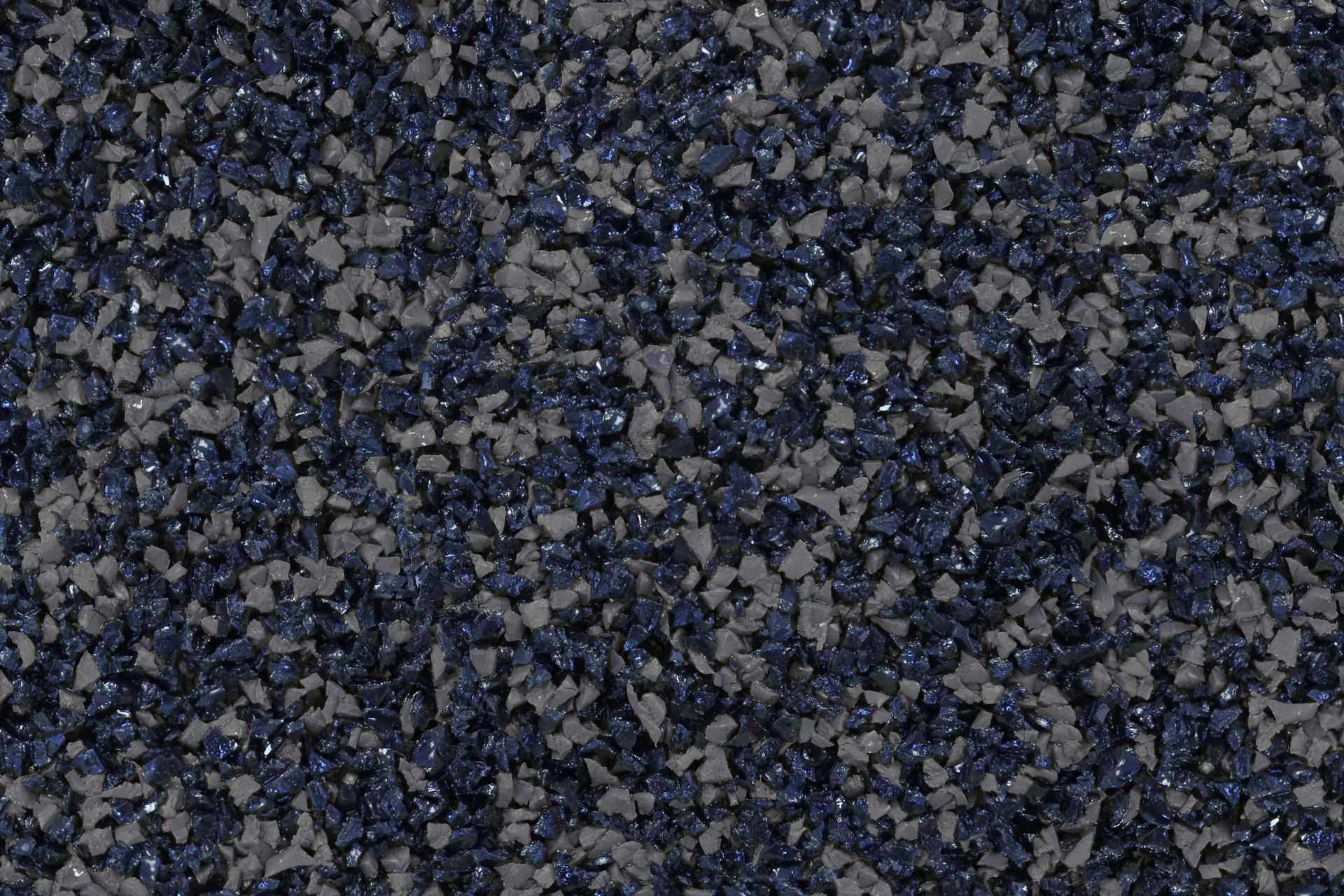 A close up of a pile of blue and gray gravel.