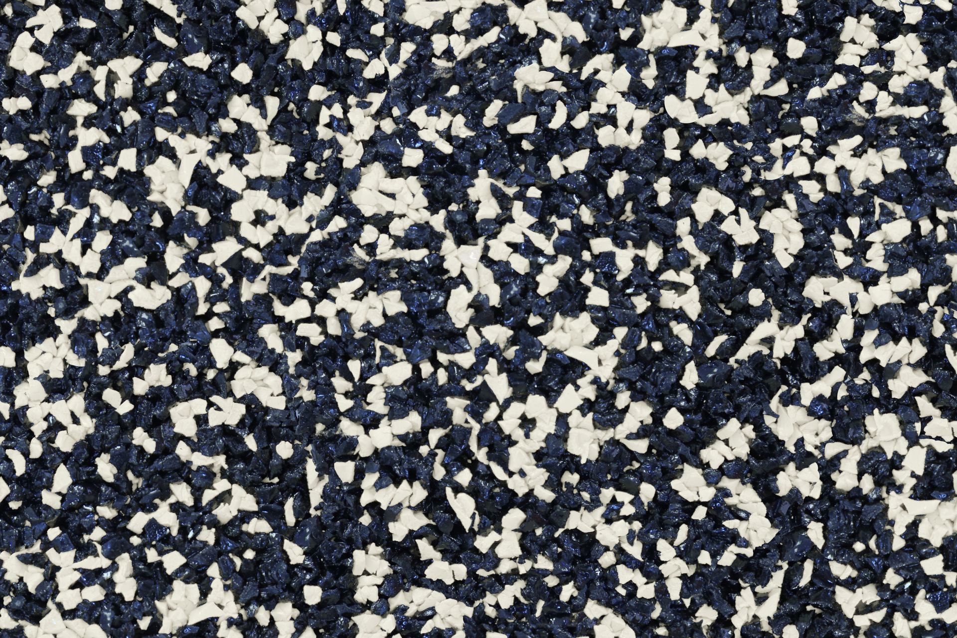A close up of a black and white carpet texture.