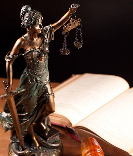 Lady justice and law books