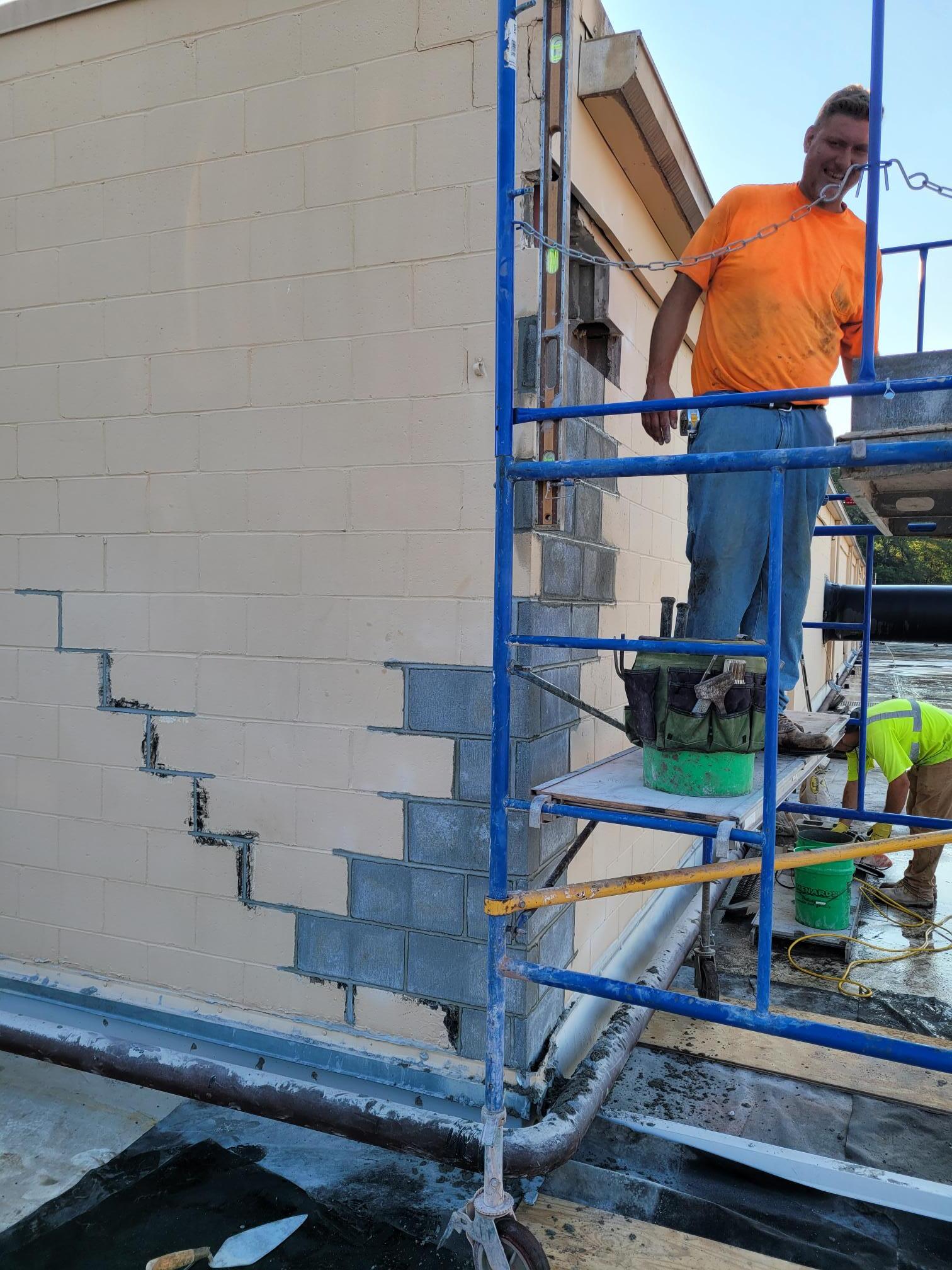 Power washing, grind and tuckpointing, block replacement