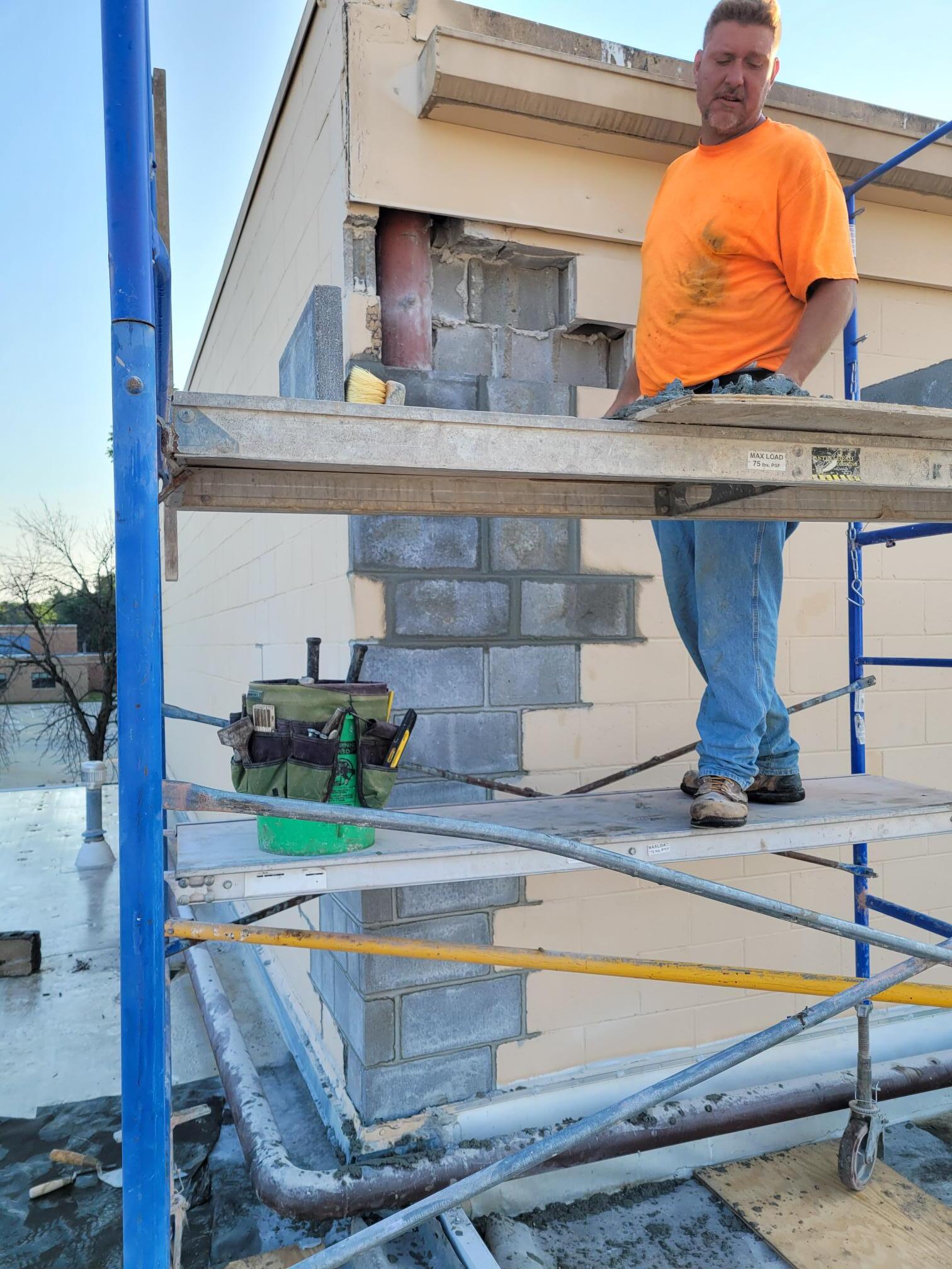 Power washing, grind and tuckpointing, block replacement